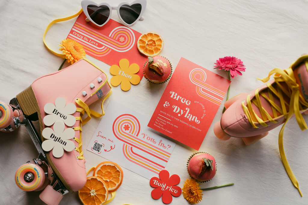 Wedding branding for colourful retro showing roller skates, flower motif and retro lines using orange, pink and yellow tones